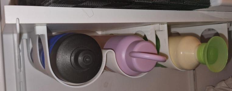 bottle holder for under a shelf