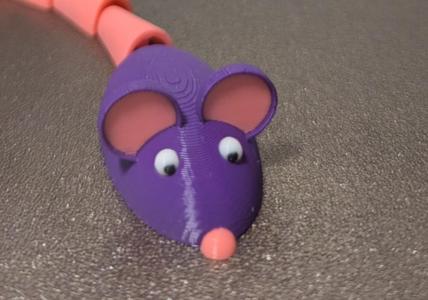 Mouse with articulated tail