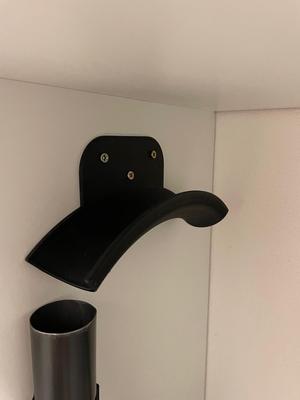 Hose holder for vacuum cleaner