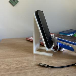 Phone stand w charger hole at bottom