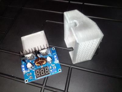 Voltage regulator cover with ventilation