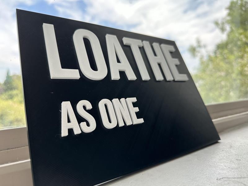 LOATHE sign