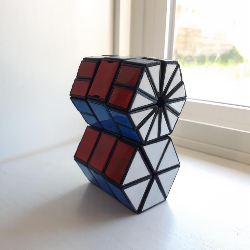 Hexagonal prism plus twisty puzzle