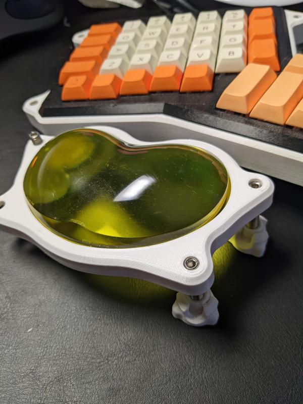 Ergonomic keyboard wrist rest tilt adjustment