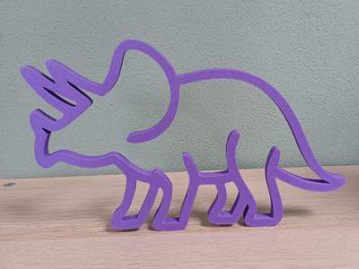 Triceratops silhouette.