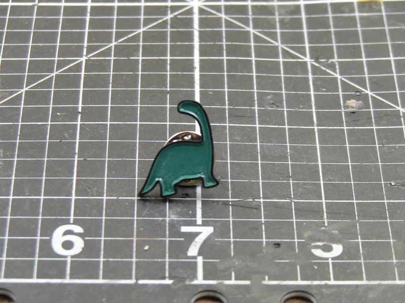 Dino enamel pin
