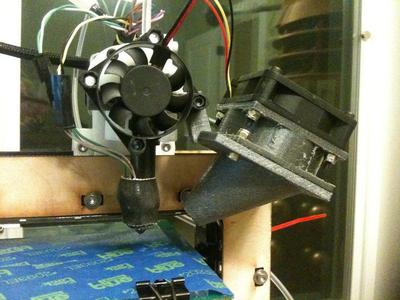 Mosaic side mounted cooling fan with nozzle