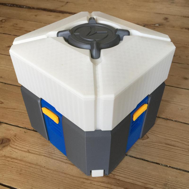 Overwatch loot box in separated colored parts