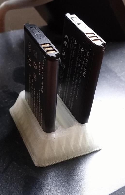 Contour battery holder