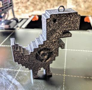 Chrome Dino Christmas tree ornament