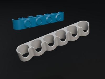 Magnetic whiteboard marker holder