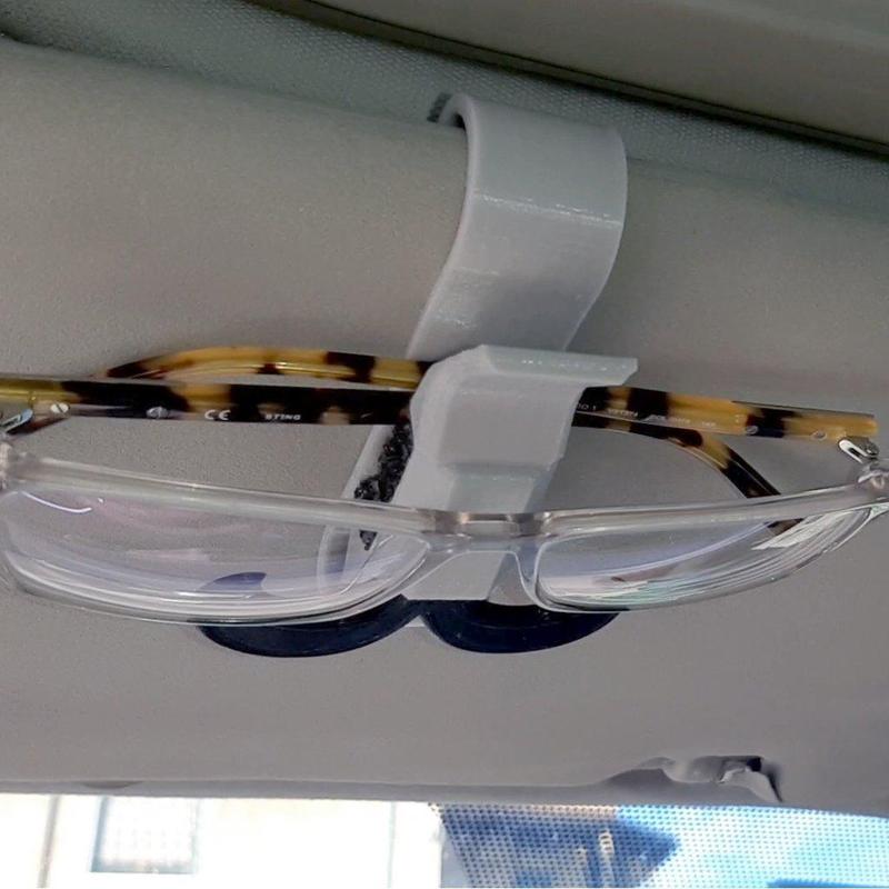Glasses holder for car sun visor