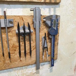 Vernier calipers wall bracket