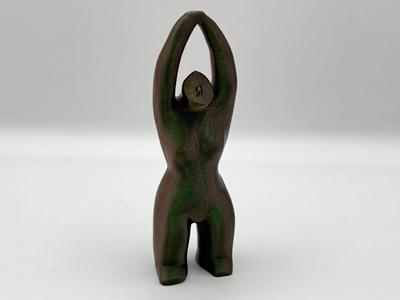 Woman Sculpture Arms Up