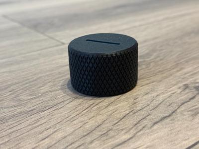 Coin container with lefthanded thread