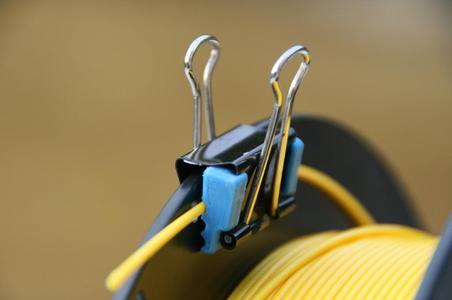 Binder clip for filament on spool