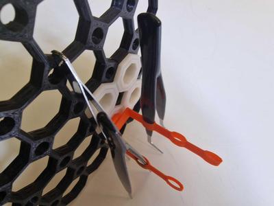 Multiboard tweezer hanger perpendicular spacesaver
