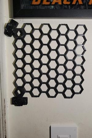 Command strip hanger for Honeycomb storage wall (now print in place)