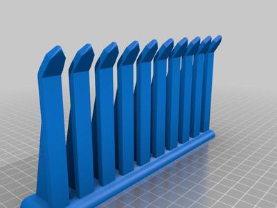 Screw mountable wire holder and screwdriver holder (OpenSCAD)
