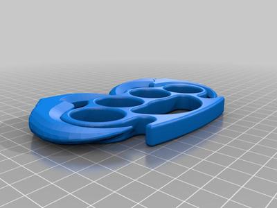 Brass knuckles raptor claw
