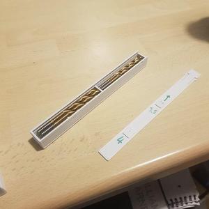 Spring tab drill bit organiser