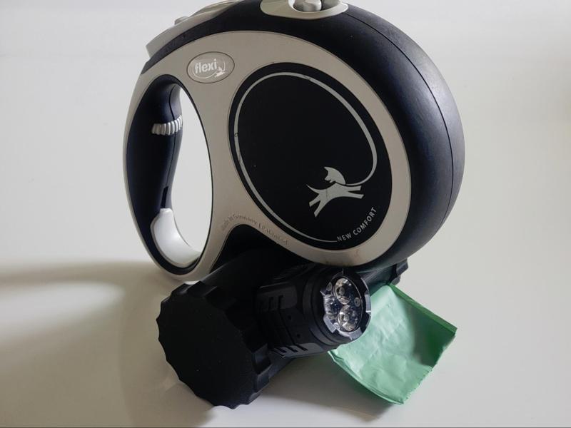 Poop bag holder with flash light mount 