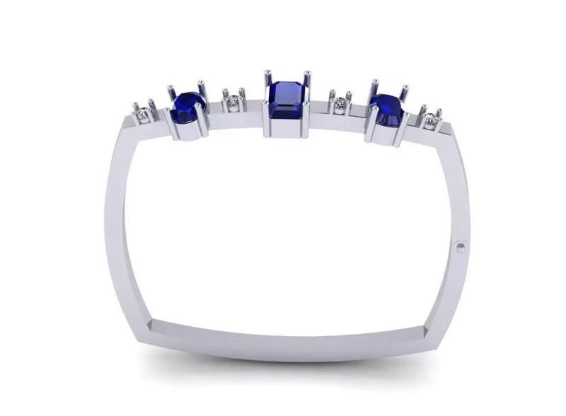 White gold bangle with diamonds and sapphire