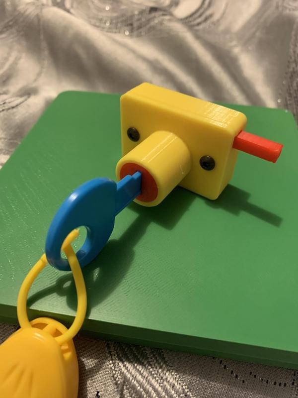 Busy board lock toy