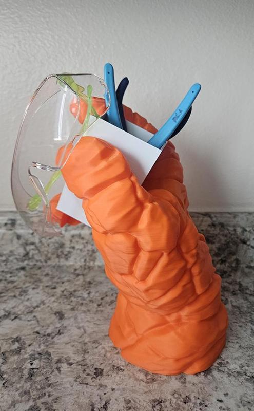 Fantastic 4: The Thing inspired hand with container.