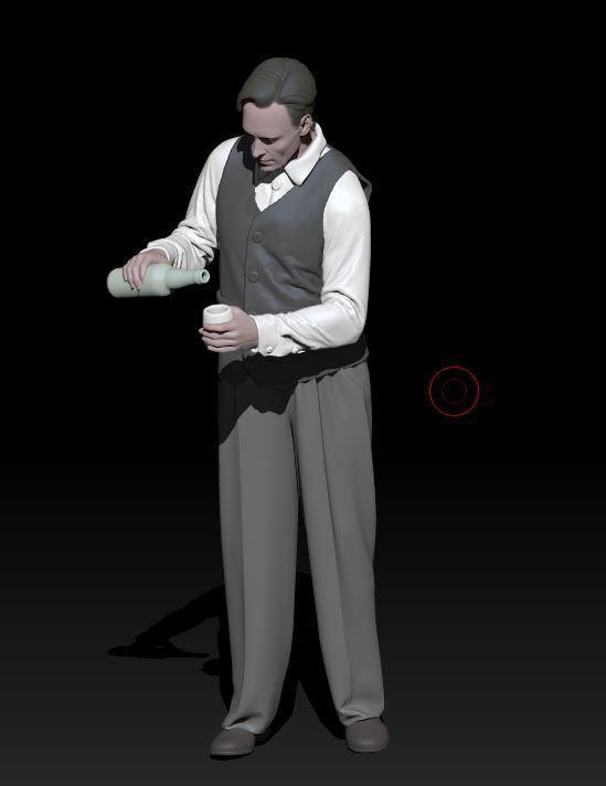 young man pours wine