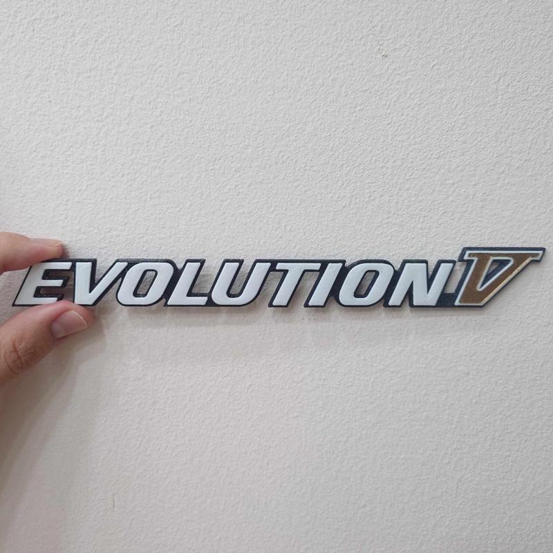 Mitsubishi Lancer "Evolution V" Badge