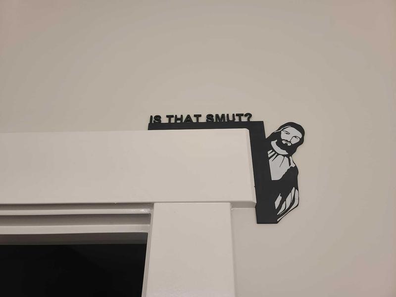 Peeking Jesus door computer hanger