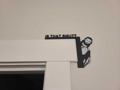 Peeking Jesus door computer hanger