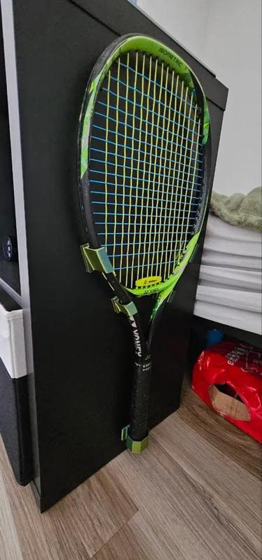 Tennis racket holder.   