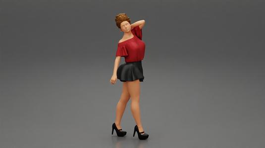 Girl walking wrearing a mini leather skirt and shirt