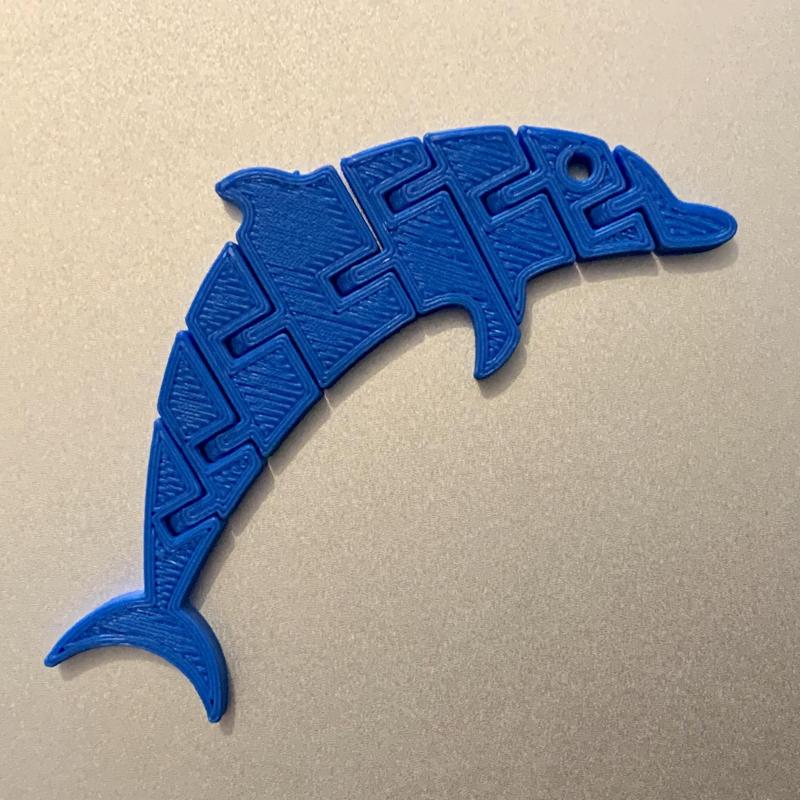 Articulated dolphin keychain