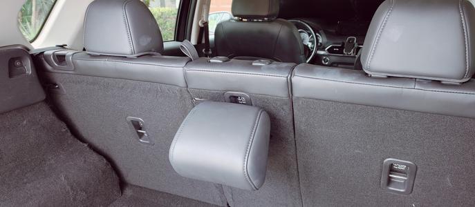 Mazda CX-5 center headrest bracket for storage