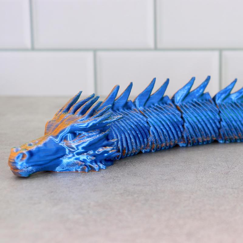 Rattle skin dragon articulated