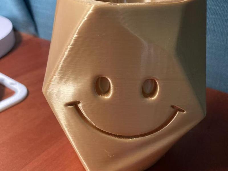 Geometric Faceted Smiley Face Pen Holder