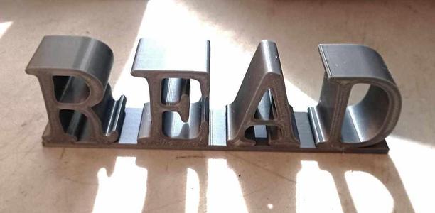 Read sign for bookshelf