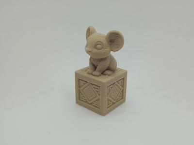 Mouse on decorated pedestal