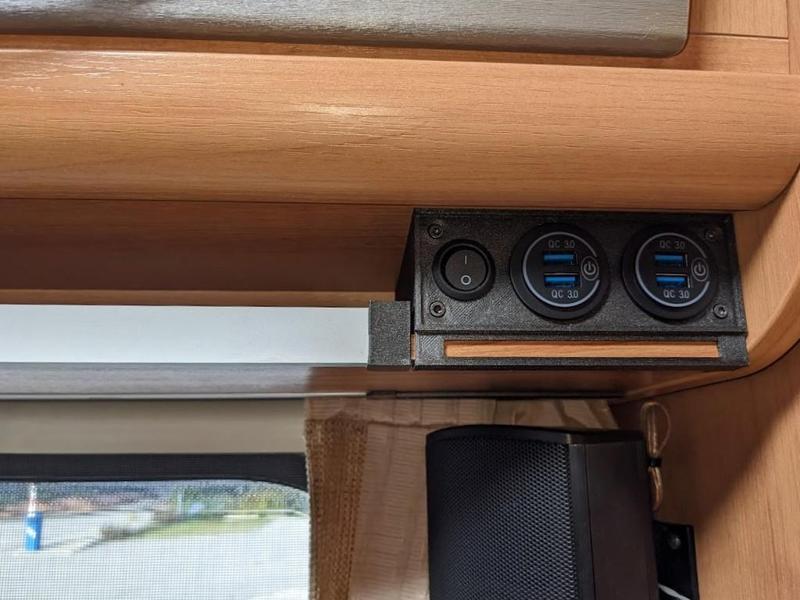 USB ports shelf for camper or RV phone charging station