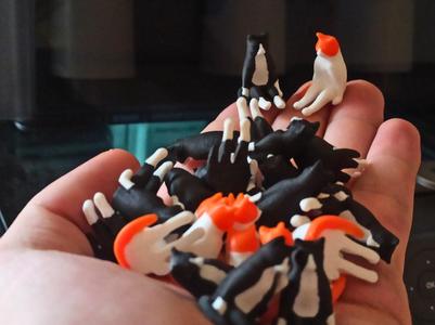 Cute tiny sitting cats