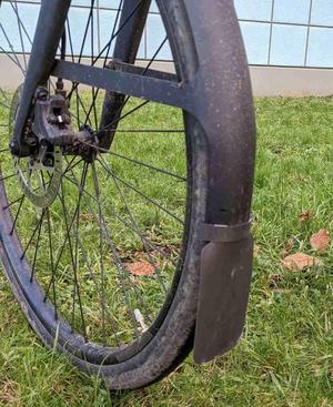 Mud flap holder for Cowboy mudguards