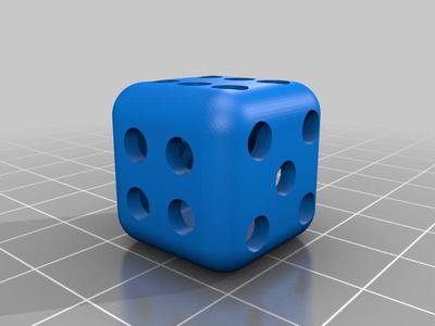 Dice with ball inside