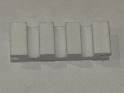 Cable/cord  holder works with Mac braided cable