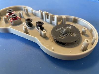 NES Tomee Dogbone controller d-pad pivot