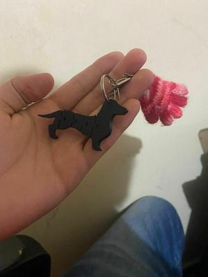 Flexible articulated dog keychain