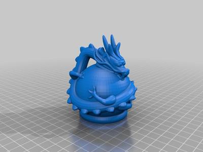 mittelgroßer Drache auf Ball