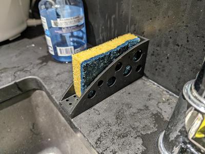 Sponge holder with water drain system